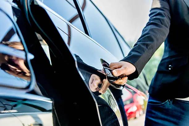 Executive black car with professional chauffeur for VIP transportation in New Jersey